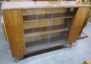 A tola wood bookcase and a teak bookcase