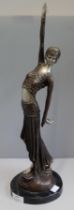 An Art Deco style bronze effect figure of an exotic female dancer, manner of Chiparus