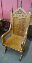 A Victorian Gothic Revival pitch pine throne chair, manner of A.W.N. Pugin