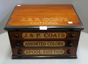 A Victorian walnut three drawer counter haberdashery cabinet, bearing J&P Coats Cottons inscription