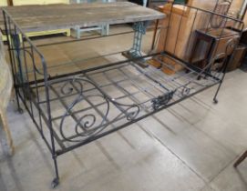 A 19th century French wrought iron bed