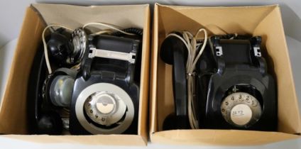 A collection of vintage telephones and parts