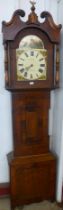 A 19th Century oak and mahogany 30-hour longcase clock, the painted dial signed T.W. Cade,