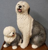 An Italian porcelain fireside English sheepdog and puppy