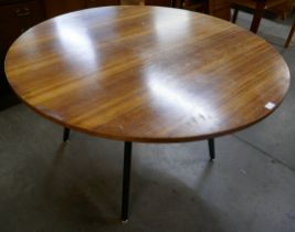 A G-Plan Librenza tola wood and black circular dining table