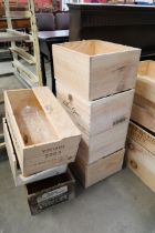 Seven six-bottle wooden wine storage boxes
