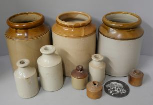 A collection of stoneware jars