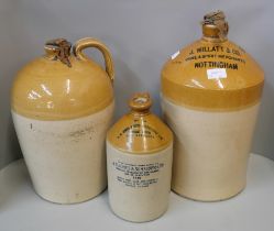 Three large stoneware jars, including Willatt, Wine Merchants, Nottingham