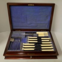 A James Deakin & Sons, Sheffield canteen of silver plate and faux ivory cutlery, cased