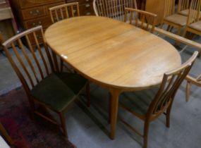 An Ercol Golden Dawn elm and beech Windsor coffee table