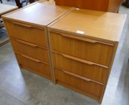 A pair of Danish Steens teak bedside chests