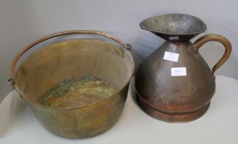 A copper pan with two handles, a copper jug and a brass jam pan