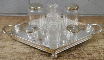 A Walker & Hall silver plated dressing table set