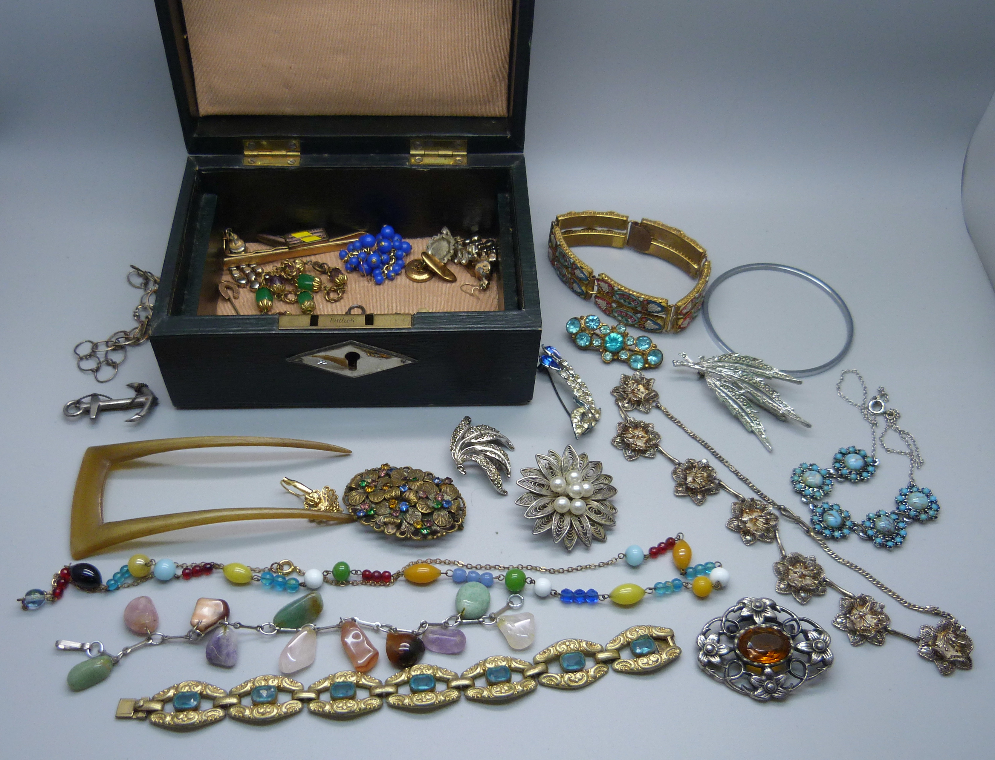 A box of vintage costume jewellery