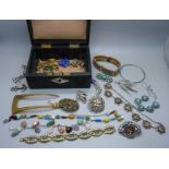 A box of vintage costume jewellery