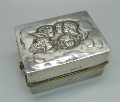 A silver burner with Reynolds angels detail, Birmingham 1903, 5.5cm x 7.5cm