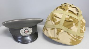 A post war Soviet army peaked cap and a helmet