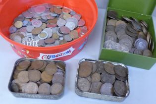 A collection of pennies, other British and foreign coins