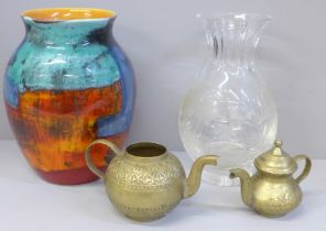 A Poole Pottery Gemstones pattern vase, crystal vase and two brass teapots, one lacking lid