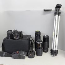 A Yashica 200F 35mm camera, four spare lenses, 35-70mm, 80-200mm, 70-210mm and 300mm and tripod
