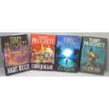 Four hardback first edition novels by Terry Pratchett, Carpe Jugulum, Night Watch, National and