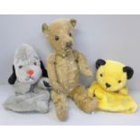 An early 20th Century Teddy bear and two modern Sooty and Sweep glove puppets, with squeak