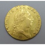 A George III full guinea, 1787, 8.4g