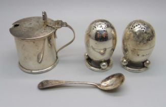 A pair of Victorian silver pepper pots and a silver mustard and spoon, 112g