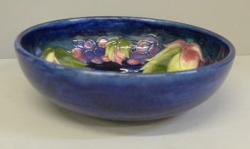 A Moorcroft berry and leaf design bowl, circa 1935, signed, 22cm