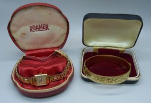 A lady's 9ct gold cased Roamer cocktail wristwatch, boxed, and a rolled gold bangle