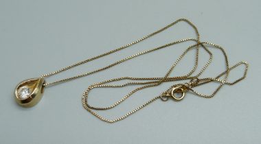 A 14ct gold and diamond pendant on a 14ct gold chain, approximately 0.4ct diamond weight, 3g,