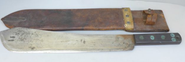 A WWII machete, the blade marked S & J Kitchin Ltd., Sheffield, No.2640