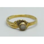 A silver gilt and mother of pearl ring, N, (1.2g)