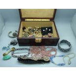 A box of vintage costume jewellery