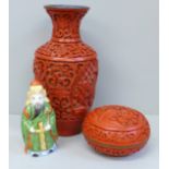 A Japanese carved cinnabar vase, lidded circular pot and a porcelain scent bottle
