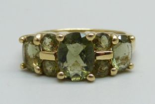 A 14ct gold and green stone ring, 3g, L
