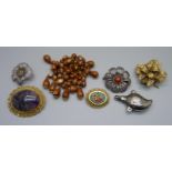 Vintage brooches including two silver filigree examples and one micro-mosaic