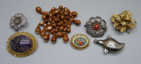 Vintage brooches including two silver filigree examples and one micro-mosaic