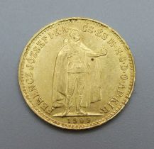 A 1909 Hungarian Franz Joseph 10 Korona gold coin, .900 purity, 3.4g
