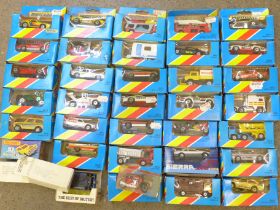 A collection of twenty early 1980s carded Matchbox die-cast vehicles and four others, boxed