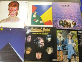 Fourteen 1970s/1980s LP records including David Bowie and Focus