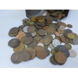A tin of British and foreign coins, many 18th and early 19th Century, including Dutch East India