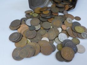 A tin of British and foreign coins, many 18th and early 19th Century, including Dutch East India