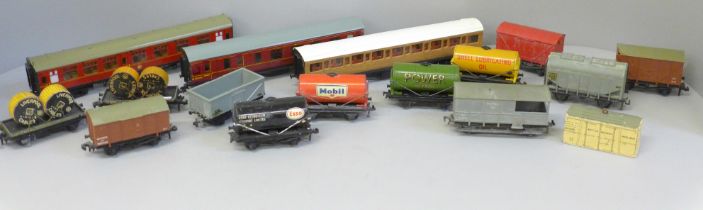 Hornby OO gauge model rail, three coaches and a collection of wagons