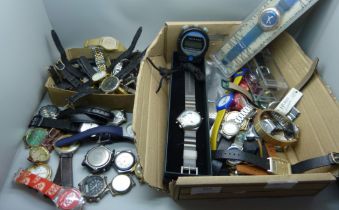 A collection of wristwatches including boxed Swatch and other Swatch watches