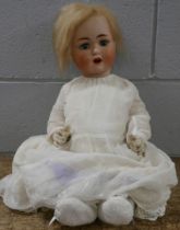 A German bisque head doll, mould no. 201 with sleep eyes, 60cm