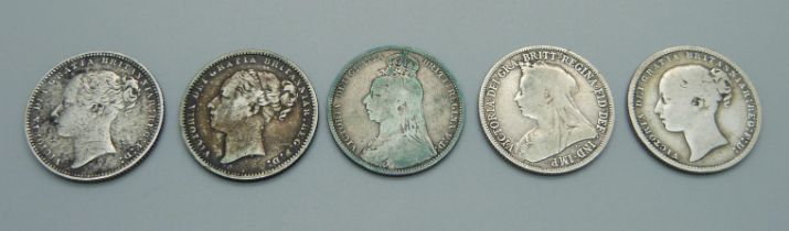 Five Victorian shillings; 1886, 1889, 1899, 1877 and 1875