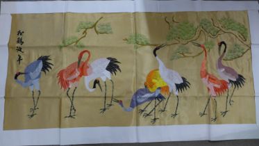 A large Chinese embroidered silk wall hanging