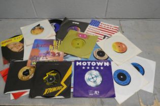 A box of 7" singles **PLEASE NOTE THIS LOT IS NOT ELIGIBLE FOR POSTING AND PACKING**
