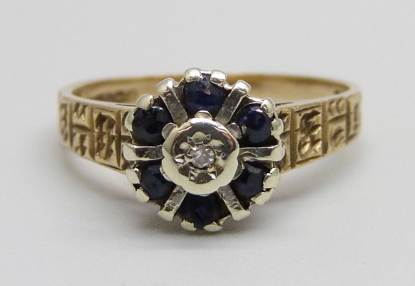 A 9ct gold, sapphire and diamond ring, 3.1g, M